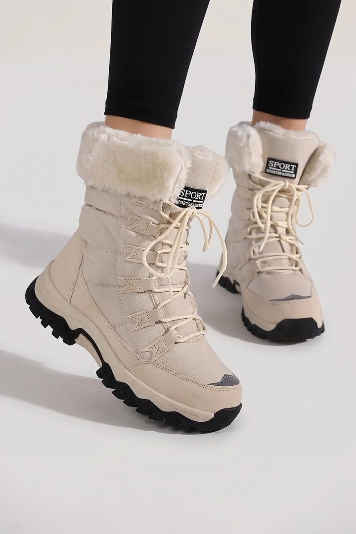 Bottes de neige matelassées à lacets beige, vue de face