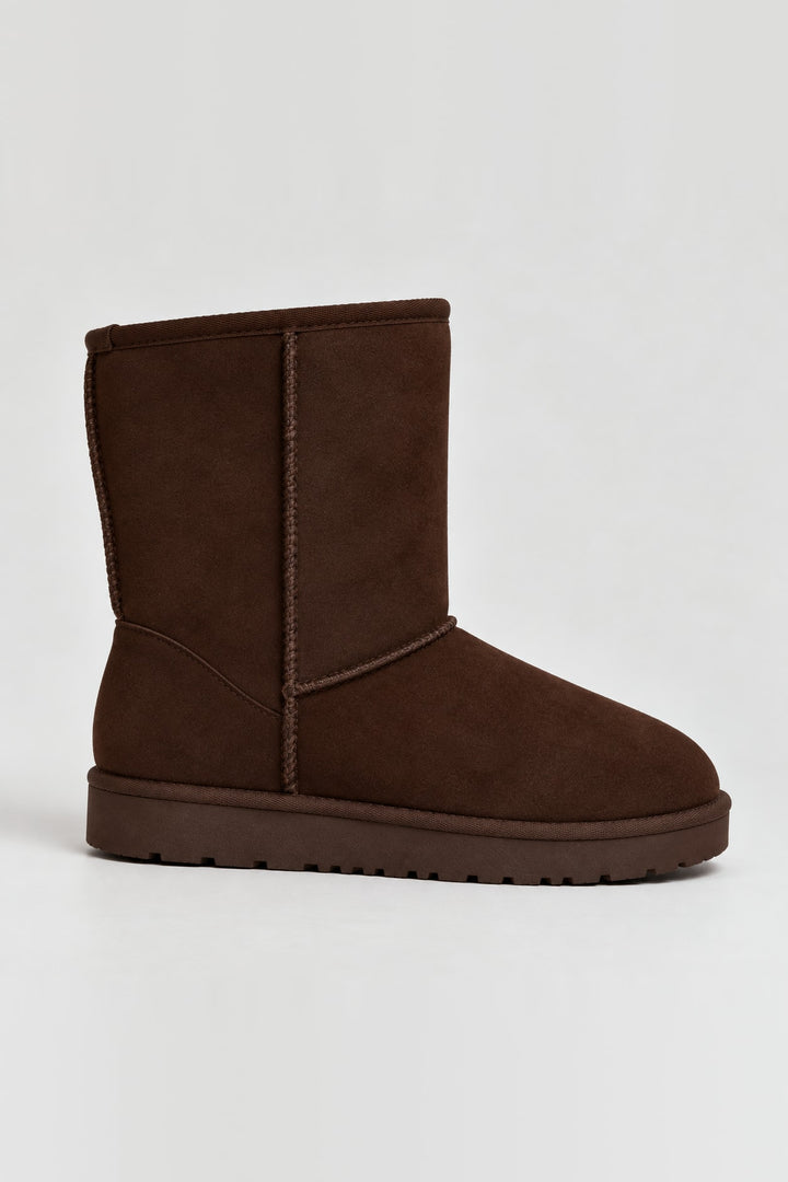 Bottes fourrées coutures apparentes marron, vue de face