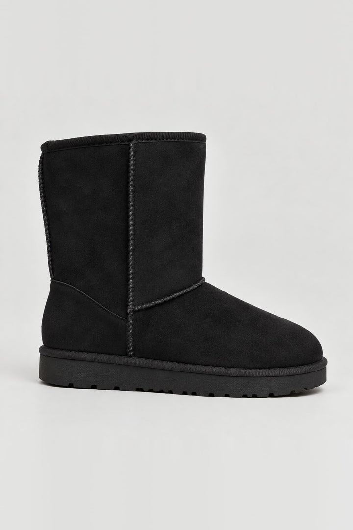 Bottes fourrées coutures apparentes noir, vue de face