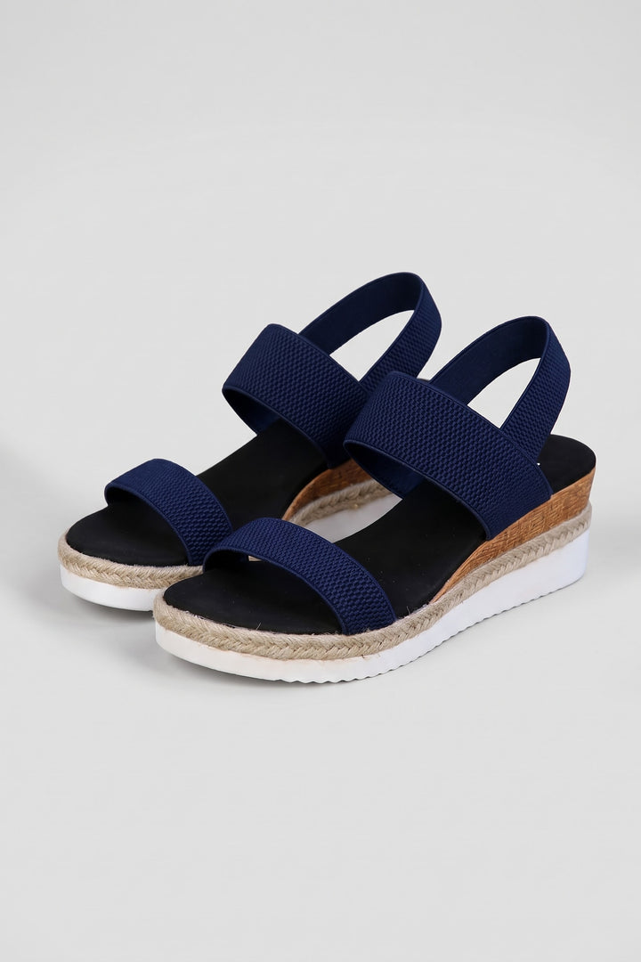 Sandales compensées à brides élastiques bleu, vue de face